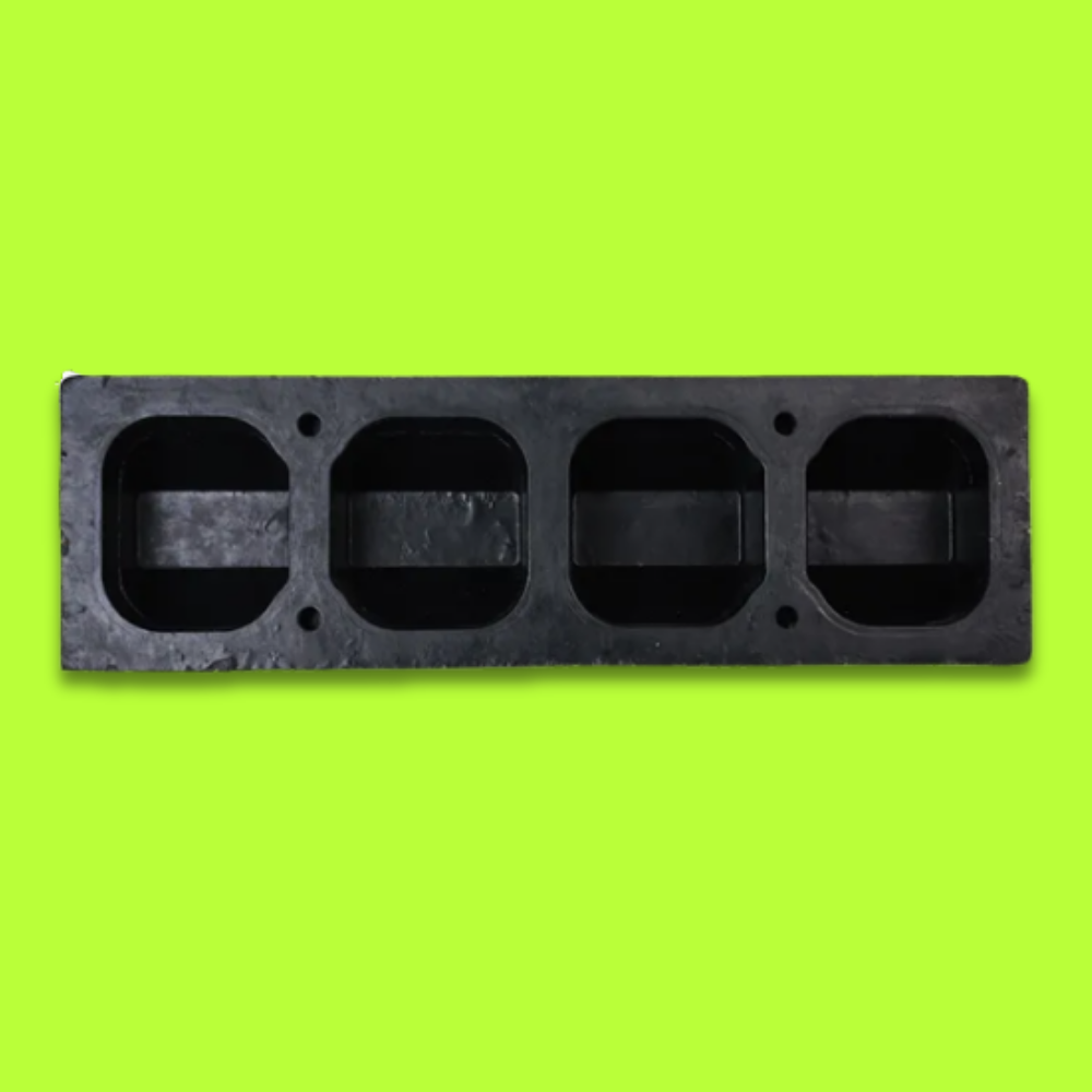 Bottom view of Base Guard® 500mm Rubber Wheel Stop on a green background
