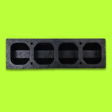 Bottom view of Base Guard® 500mm Rubber Wheel Stop on a green background