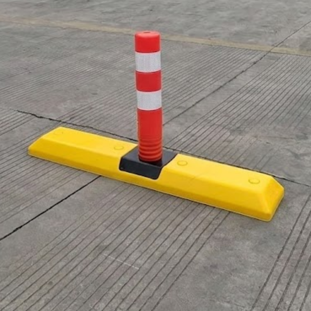 Base Guard 500mm Traffic Lane Divider with Flexible Warning Post on a concrete surface