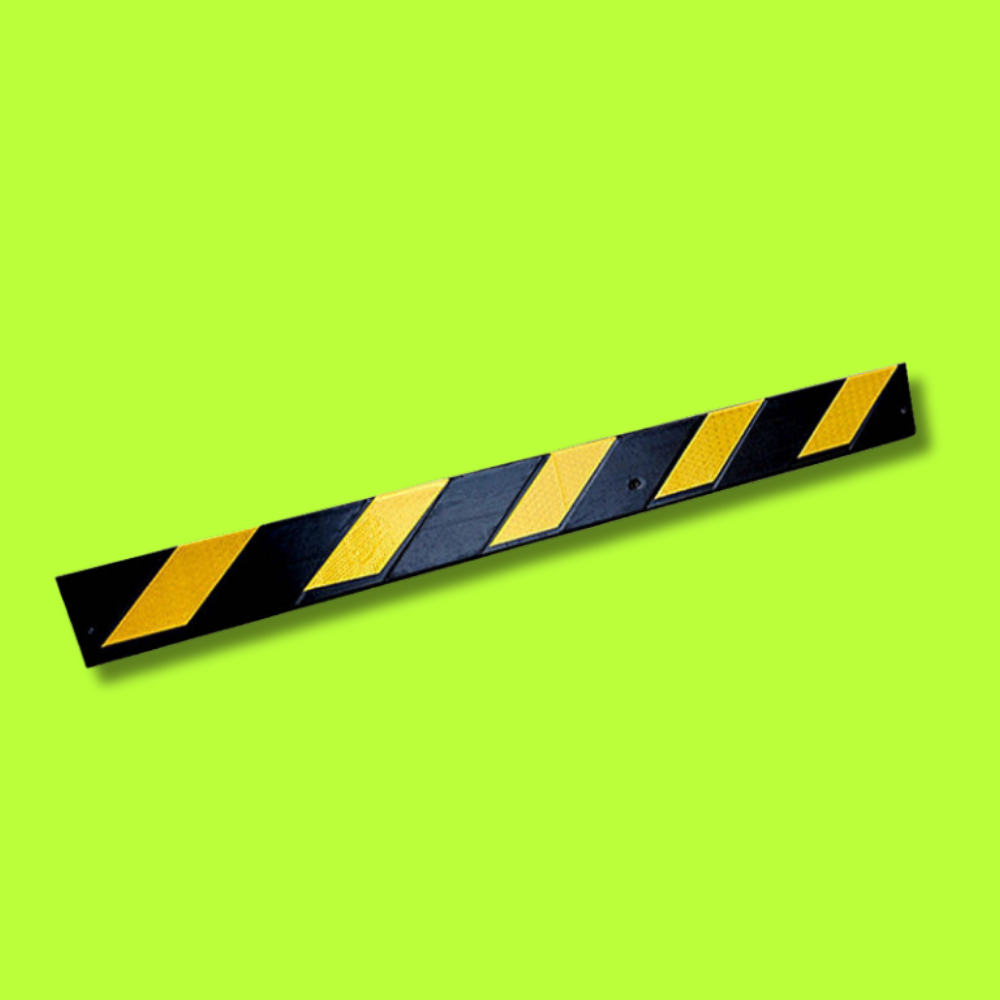 Zoomed in Base Guard Chevron Rubber Corner Guard – Heavy Duty on green background