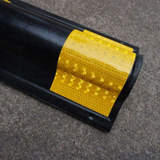 Base Guard Heavy Duty Rubber Corner Guard on cement floor Background
