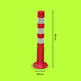 Red and white striped bollard with dimensions on a green background