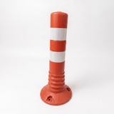 Orange traffic cone with reflective white stripe on a white background