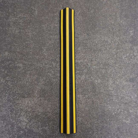 Base Guard Stainless Steel Reinforced Rubber Corner Guard on concrete surface