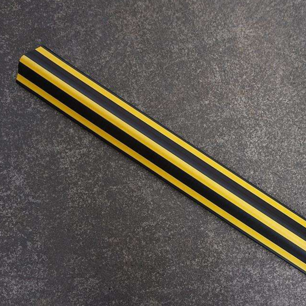 Base Guard Stainless Steel Reinforced Rubber Corner Guard on concrete surface