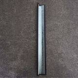Bottom view of Base Guard Stainless Steel Reinforced Rubber Corner Guard on concrete surface