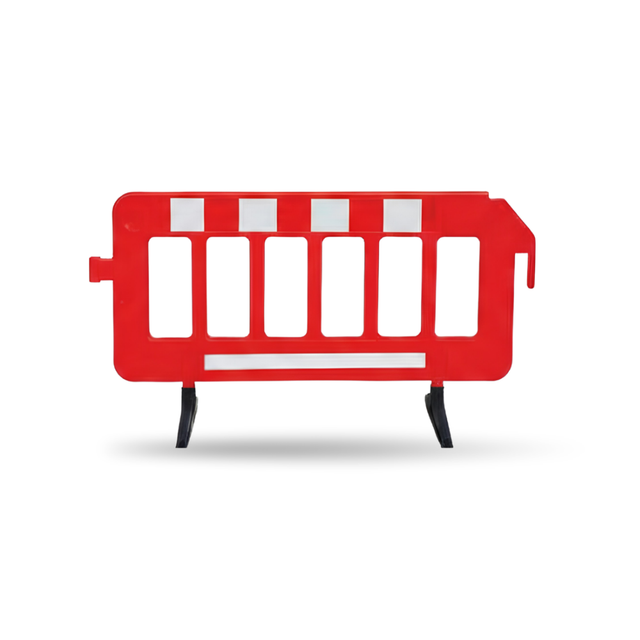 Red plastic barrier with white stripes on a white background