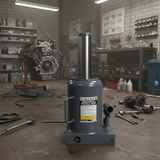 Bottle jack in a workshop setting with tools and equipment around