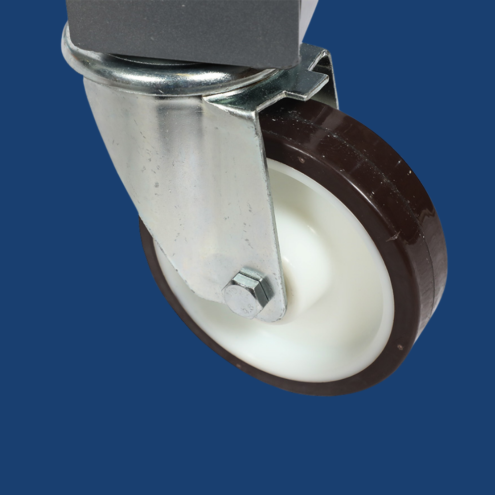Close-up of a caster wheel with a blue background