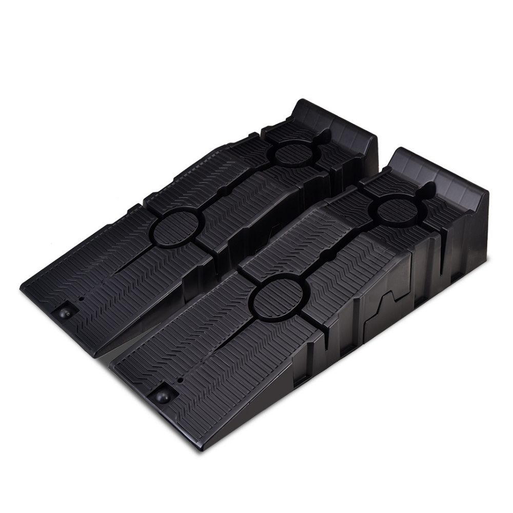 Set of black plastic ramps on a white background