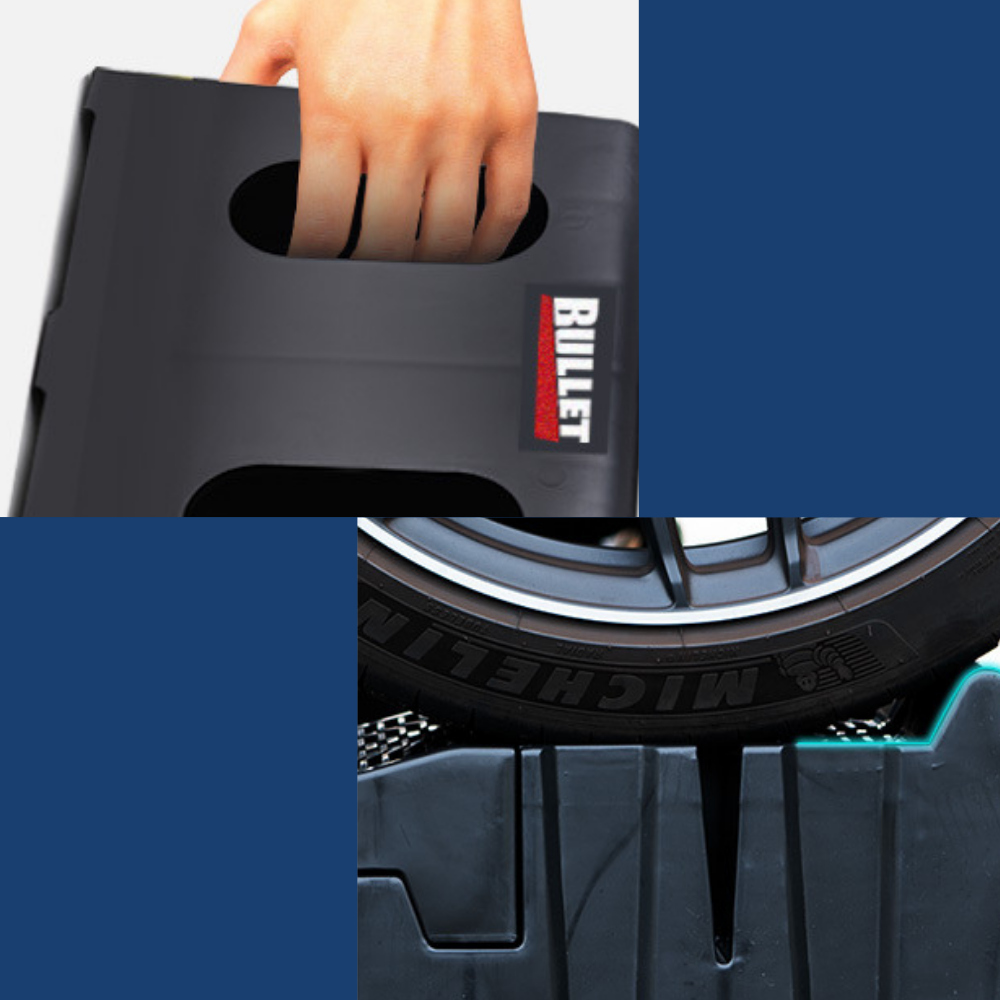 Black tire jack with 'Bullet' branding being used to lift a car tire.