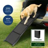 Dog using a black pet ramp to enter a car, with product details on capacity and dimensions.