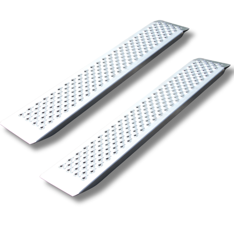 Two white metal grates with a grid pattern on a white background