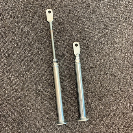 Two detachable support legs, highlighting added stability features for ramps during heavy loads.