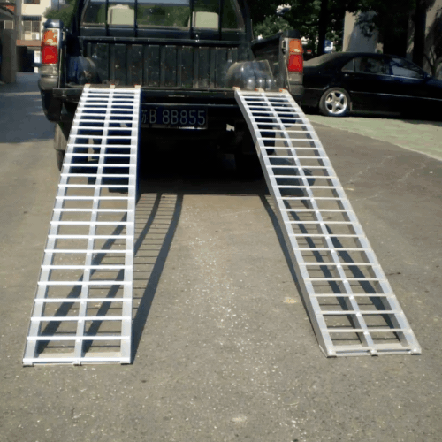 Pair of Heeve® 500kg 2.23m x 300mm Curved Non-Folding Aluminium Loading Ramps on the rear of Ute