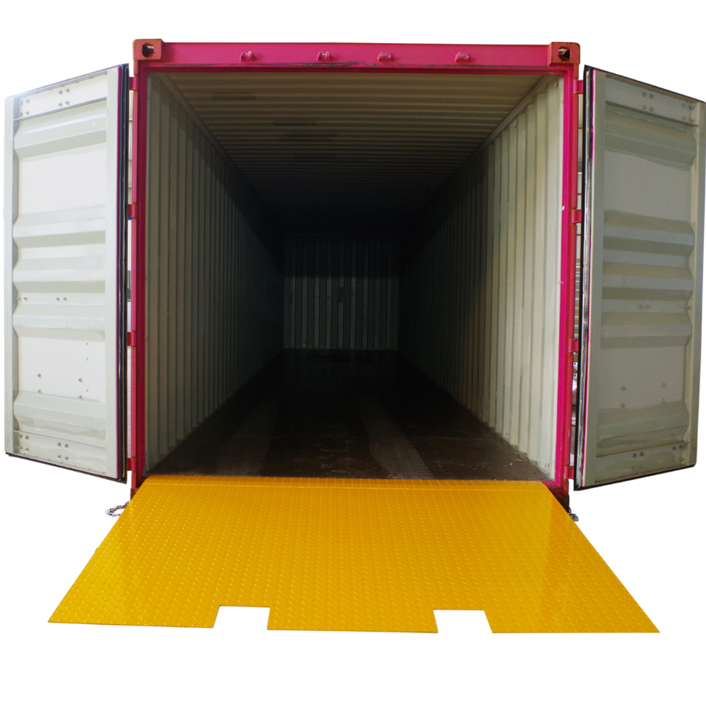 Yellow loading dock mat in front of an open shipping container
