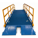 A blue metal yard ramp with bright yellow guardrails and two hinged ramp doors at the front, shown on a clean white background.