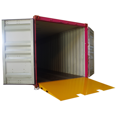 A yellow Heeve self-supporting forklift container ramp placed in front of an open shipping container, showing the forklift tyne slots and the anti-skid surface.