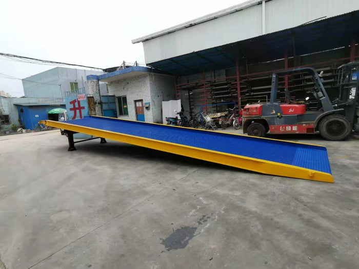 Heeve yard ramp on a yard with a forklift beside it