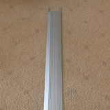 Kilargo 100mm Heavy-Duty Aluminium Threshold Plate 14mm High on a carpet surface 