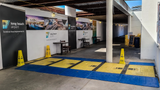 Oxford Plastics LowPro 15/10 trench cover laid across a walkway with blue ramps