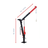 Small crane with red and black design on a white background