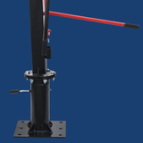 Black mechanical device with a red lever on a blue background