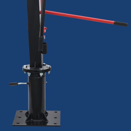 Black mechanical device with a red lever on a blue background