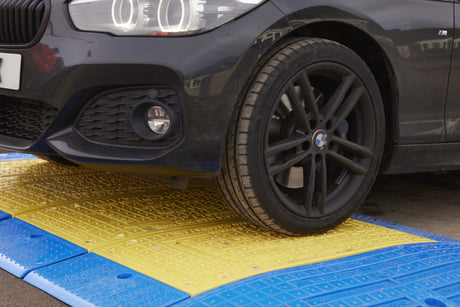 Car driving onto an Oxford Plastics LowPro 15/05 road plate