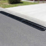 Narrow ramp profile viewed from side at kerb.

