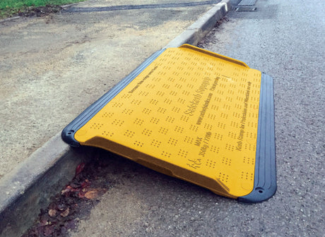 Oxford Plastics SupaGrip SafeKerb ramp fitted at a kerb edge