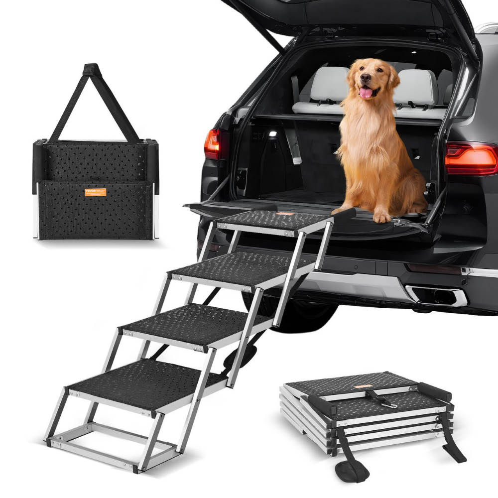 Dog using a set of folding steps to enter a car, with a pet carrier in the background.