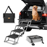 Dog using a set of folding steps to enter a car, with a pet carrier in the background.