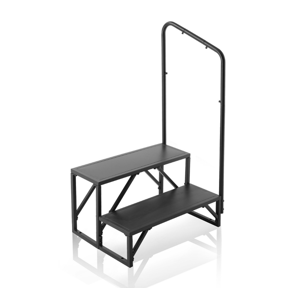 Black metal step stool with a handrail on a white background