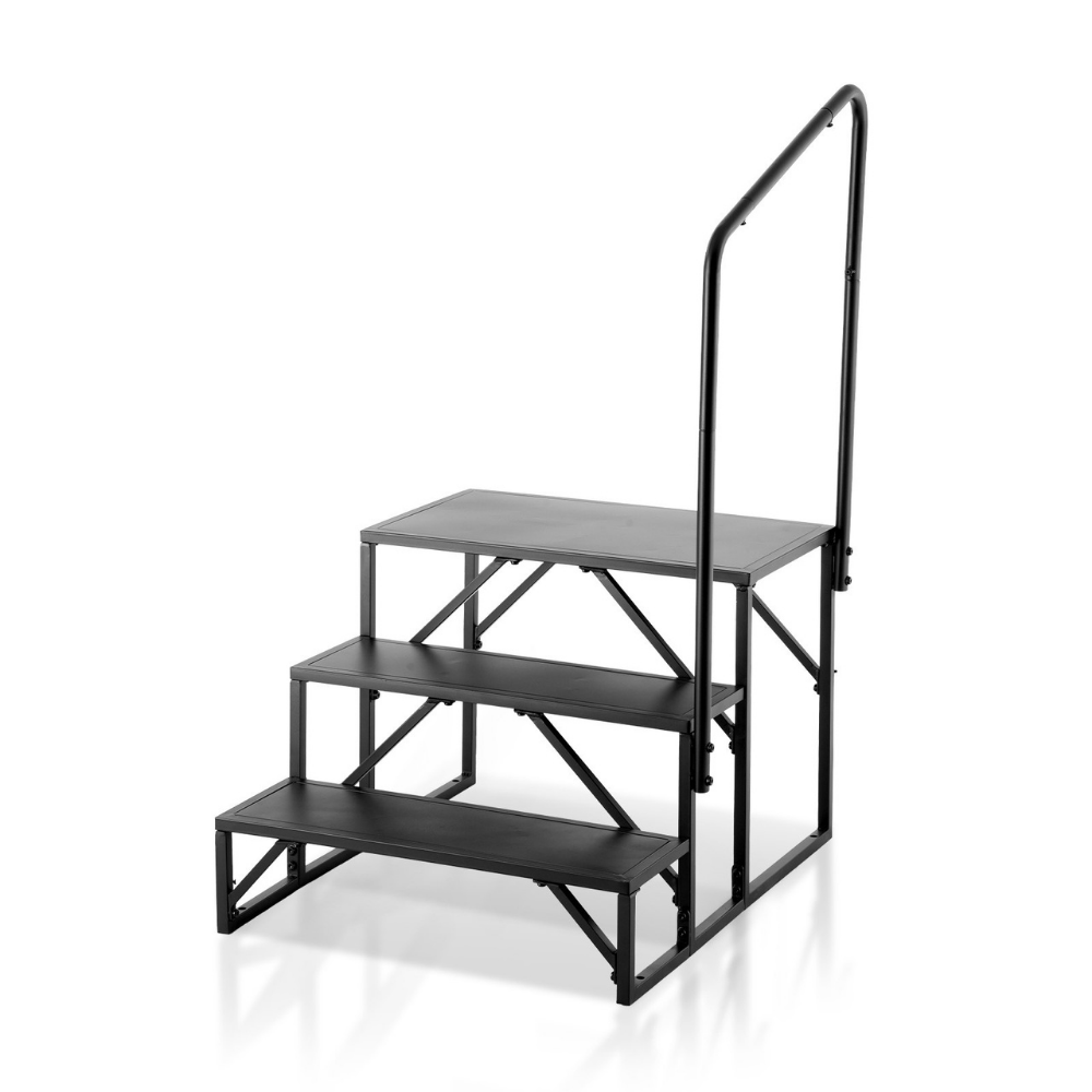 Black metal step ladder on a white background