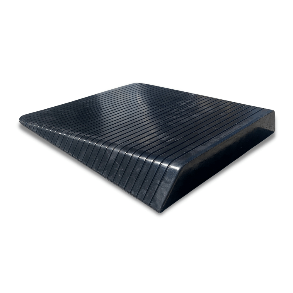 black rubber ramp rear view on a solid white background