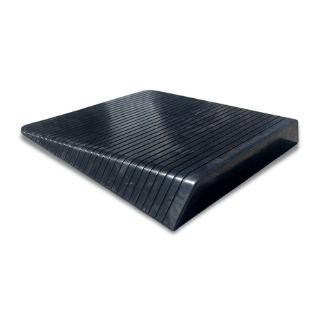 black rubber ramp rear view on a solid white background