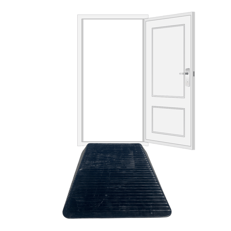 A black solid rubber wheelchair threshold door ramp with winged edges placed on adoorway
